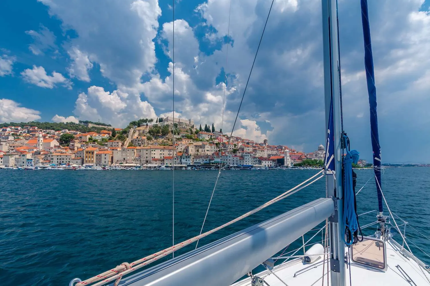 Šibenik old town seen from the deck of a sailing yacht